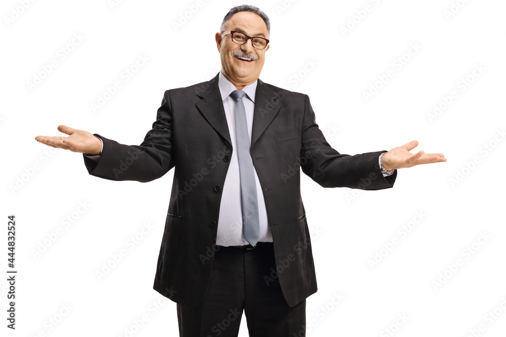 Mature businessman smiling and gesturing with hands Mature businessman smiling and gesturing with hands