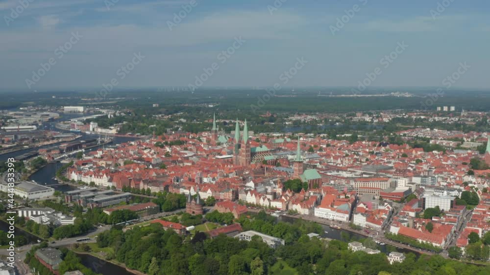 Aerial panoramic view of medieval city centre. Brick buildings in historic part of town in UNESCO world heritage site. Luebeck, Schleswig-Holstein, Germany Aerial panoramic view of medieval city centre. Brick buildings in historic part of town in UNESCO world heritage site. Luebeck, Schleswig-Holstein, Germany