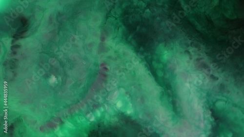 Wallpaper Mural Flowing glitter waving surface. Flowing Golden abstract backdrop. Beautiful metallic green texture paint close-up. Liquid slow motion Art. Colorful Chaos Turbulence.  Torontodigital.ca