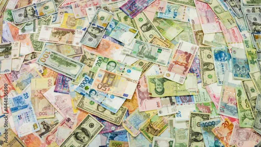 Colorful different country Paper Money background, studio shot. Colorful different country Paper Money background, studio shot.