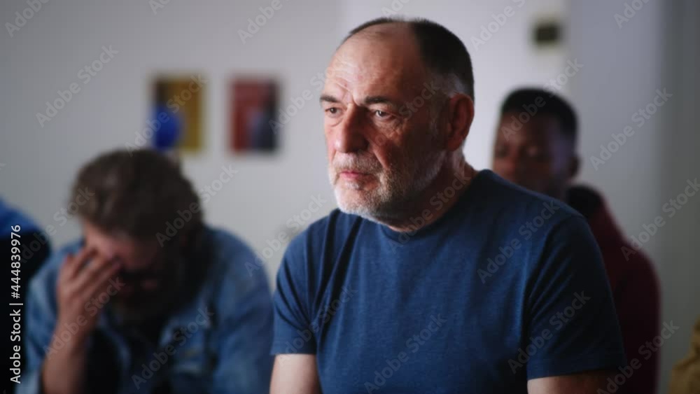 Angry aged man talking about addiction Angry aged man talking about addiction