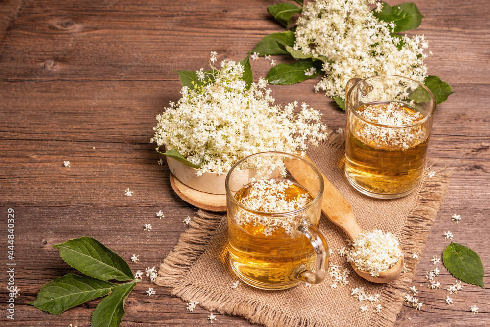 Elderberry flower tea. Refreshing summer drink, healthy lifestyle concept Elderberry flower tea. Refreshing summer drink, healthy lifestyle concept
