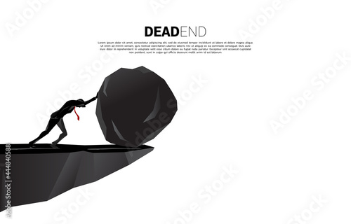 Silhouette of businessman pushing the big rock to the abyss ahead. concept of business challenge and problem.