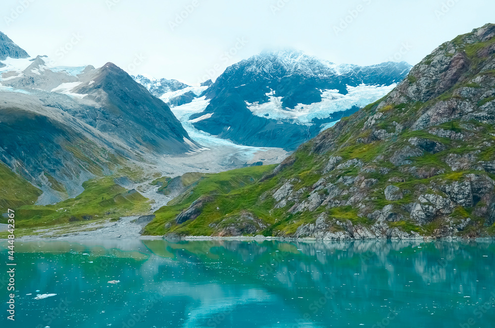 Alaska landscape mountains and water, sunny day, turquoise watercolor. Mountains reflection in the water. Remote location, unplugged. Wild beauty in nature. Untouched environment