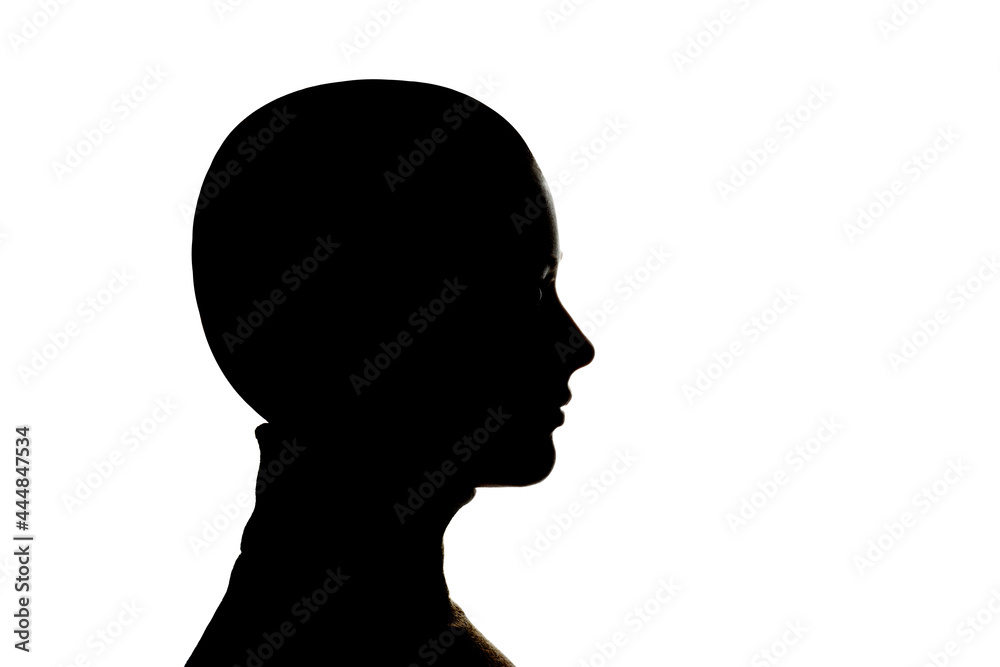 Dark silhouette of a woman on white background close-up.