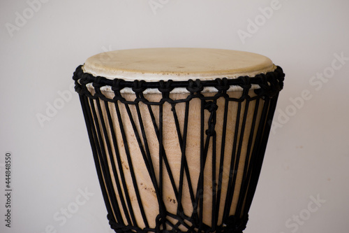 A djembe or jembe is a rope tuned skin covered goblet drum played with bare hands is a percussion instrument orginally from West Africa