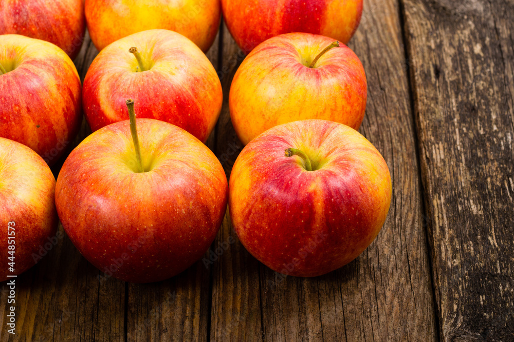 apple fruits in a row, old weathered wood table background apple fruits in a row, old weathered wood table background