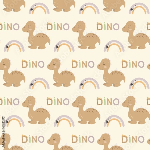 Hand drawn seamless pattern with dinosaurs  lettering and rainbow. Perfect for kids fabric  textile  nursery wallpaper. Cute dino design. Vector illustration.