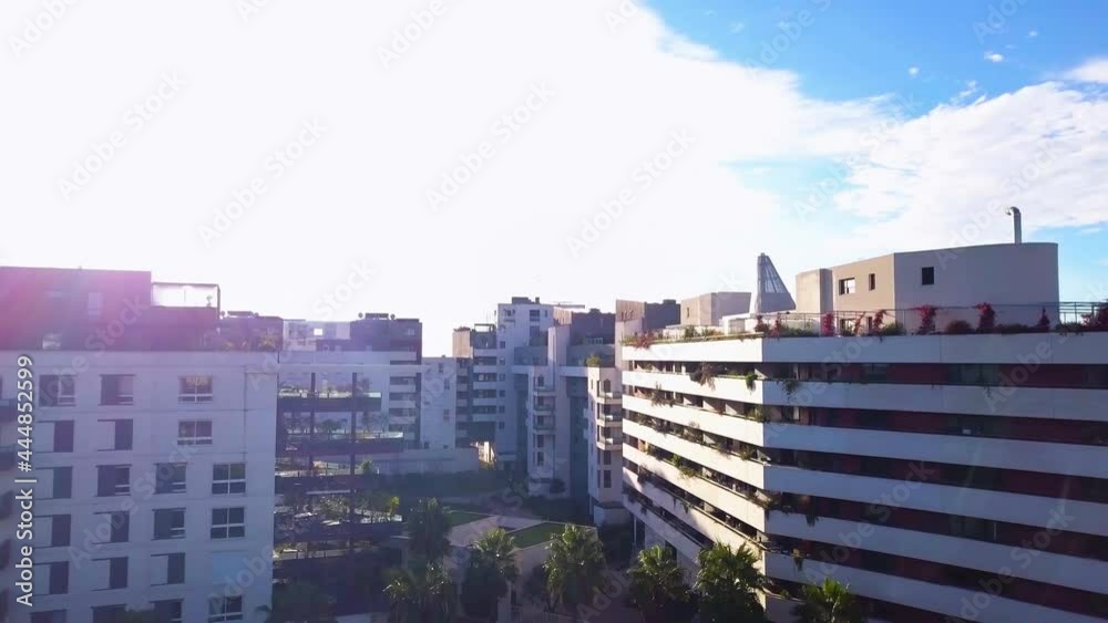 aerial view of a group of new modern buildings and palm trees in the heart of a city in the south of France aerial view of a group of new modern buildings and palm trees in the heart of a city in the south of France