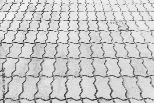 Perspective View Monotone white Brick Stone Pavement on The Ground for Street Road