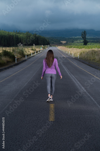 Woman walking on the street with natural backgroung