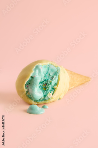 blue ice cream cone glazed with white chocolate