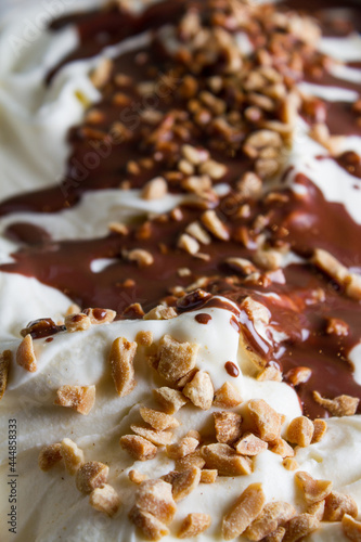 soft vanilla ice cream with chocolate and peanuts