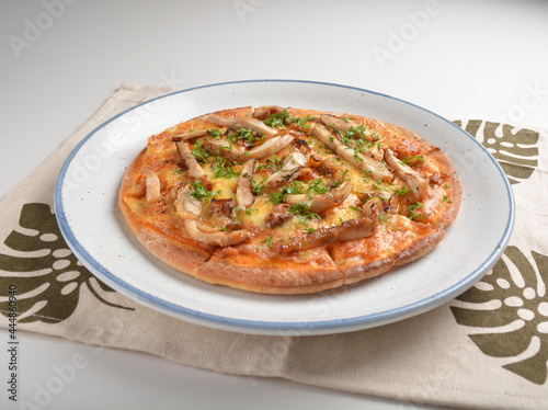 chef asian baked teriyaki bbq chicken cheesy pizza in plate on white table hotel fine dining restaurant western halal cafe menu