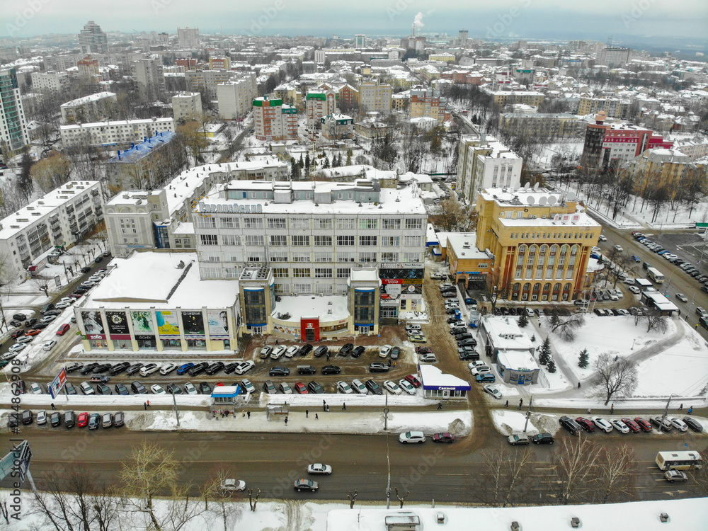 Aerial view of shopping malls on Vorovskogo street in winter (Kirov, Russia)