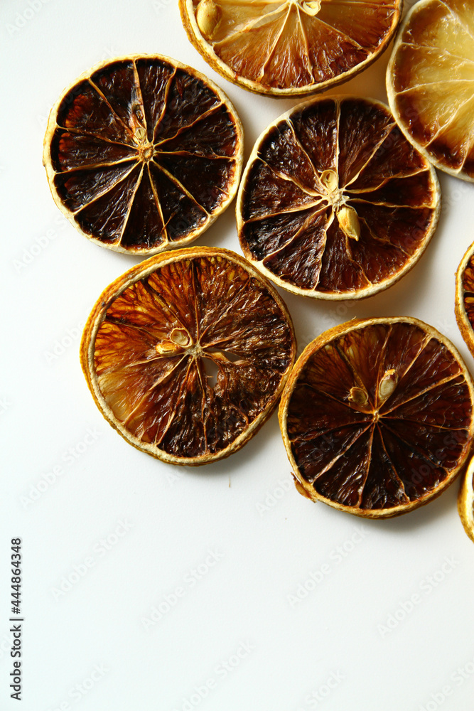 Close up of dried lemon slice on white background Close up of dried lemon slice on white background