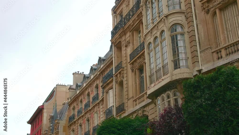 Haussmann Style Building With Bow Windows At 7 Rue Rembrandt, 8th Arrondissement Of Paris In France. low angle Haussmann Style Building With Bow Windows At 7 Rue Rembrandt, 8th Arrondissement Of Paris In France. low angle