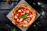 true Italian Pizza. Traditional Pizza Margherita with fresh mozzarella and basil
