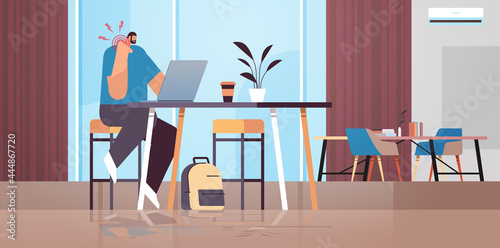businessman at workplace suffering from neck pain inflammation of muscles concept