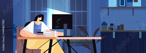overworked businesswoman sitting at workplace business woman freelancer looking at computer screen