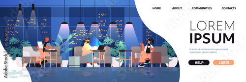 tired businesspeople working together in creative coworking center teamwork concept dark night office interior