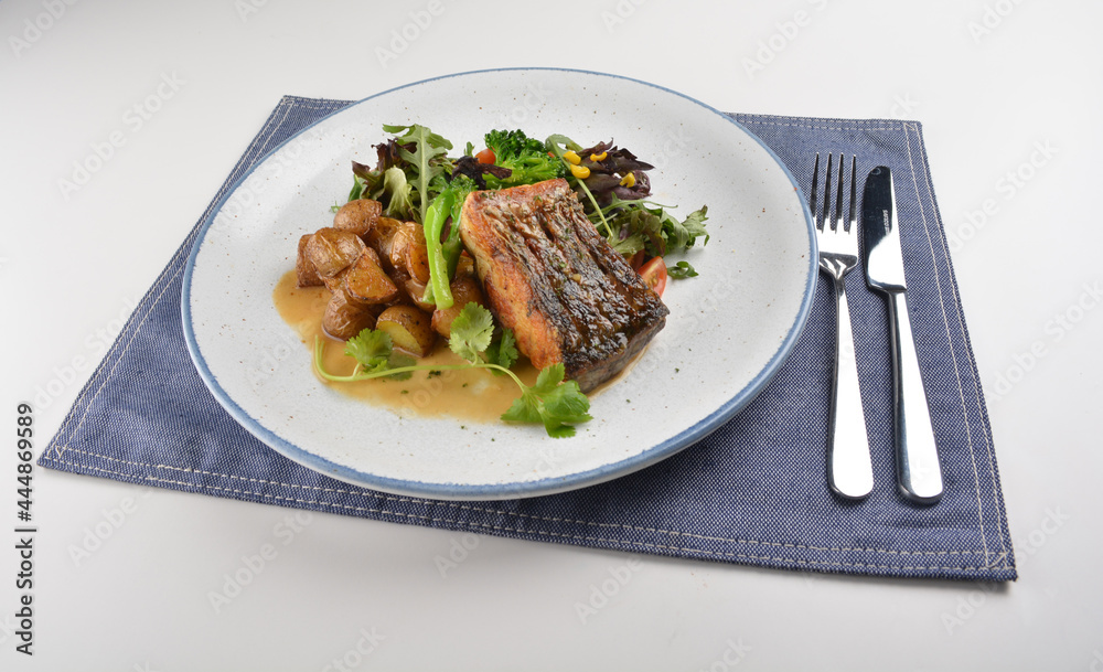 pan fried bbq fresh cod, salmon, grouper fish fillet in chef sauce with potato, corn and vegetables western halal menu pan fried bbq fresh cod, salmon, grouper fish fillet in chef sauce with potato, corn and vegetables western halal menu