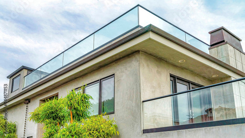 Pano Beautiful exterior of house in Long Beach California with rooftop balcony
