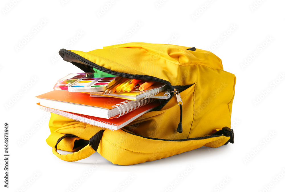 Naklejka premium School backpack with stationery on white background