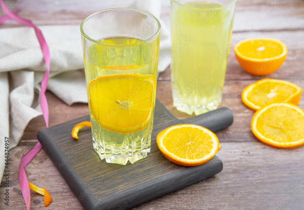 glasses of homemade lemonade on wooden table