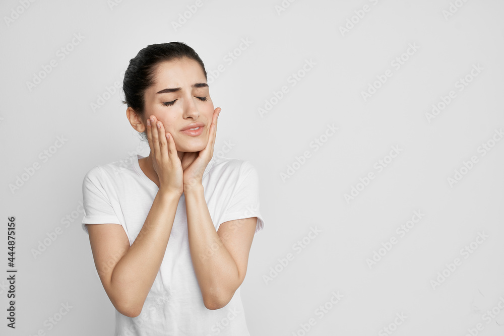 woman with toothache holding face medicine dentistry