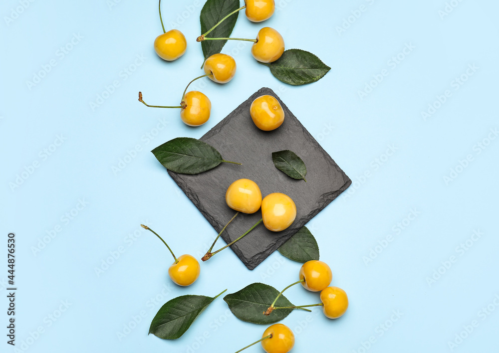Tasty sweet cherries on color background Tasty sweet cherries on color background
