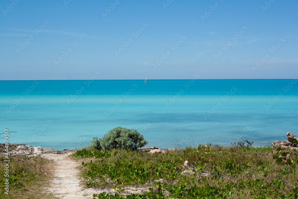 Cayo Santa María landscape, in Cuba. Turquoise ocean and perfectly flat and straight horizon line. Cayo Santa María landscape, in Cuba. Turquoise ocean and perfectly flat and straight horizon line.