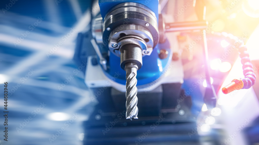 Obraz premium Modern Drilling CNC machine in automatic production copy space