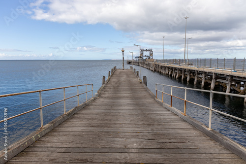 The wooden jetty along side the wharf in Kingscote Kangaroo Island South Australia on May 9th 2021