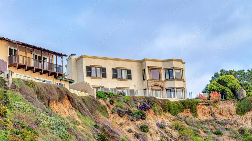 Pano Buildings on steep land with cloudy blue sky background in San Diego California
