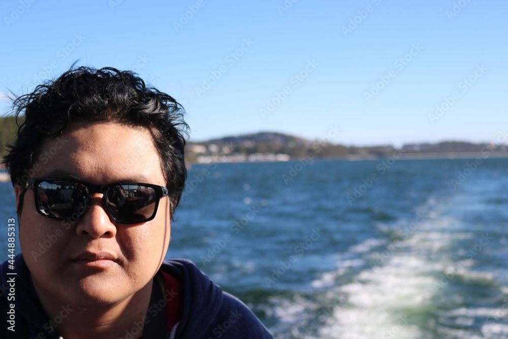 Person riding a boat Person riding a boat