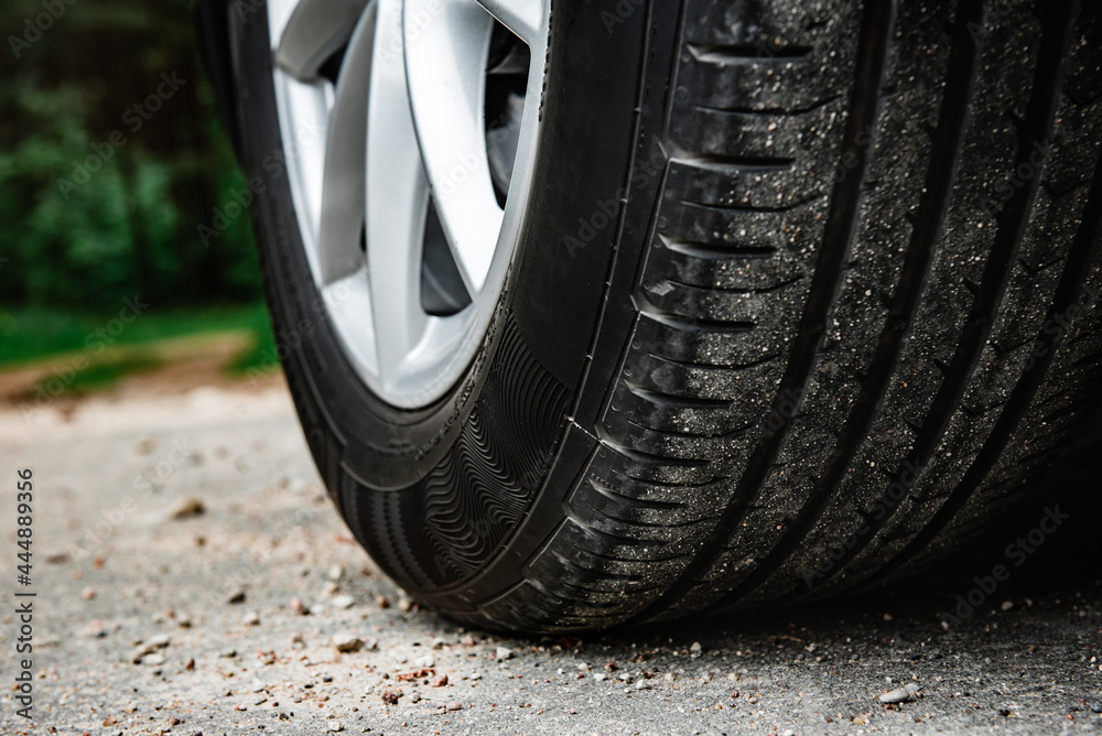 Car wheel on a asphalt.