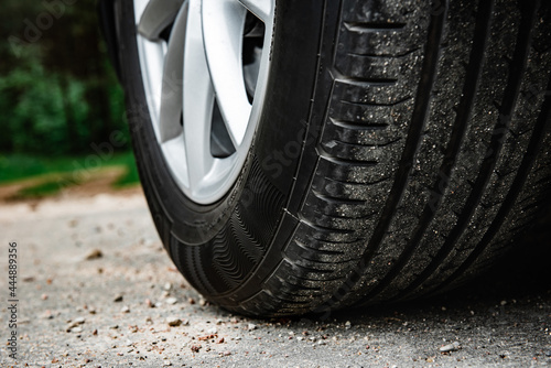 Car wheel on a asphalt. © Natallia
