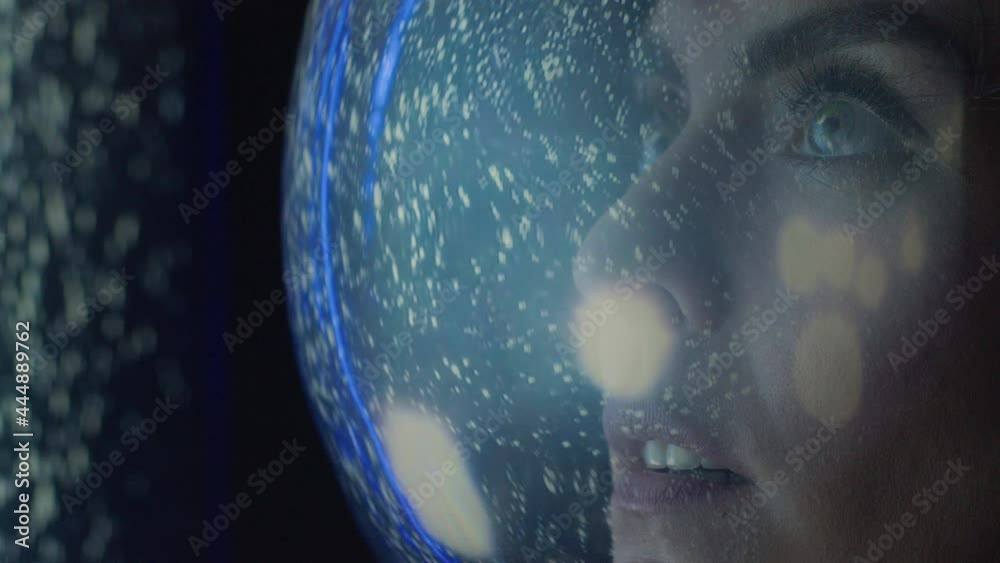 Woman astronaut in helmet looks at space stars, cosmos exploration, discovery