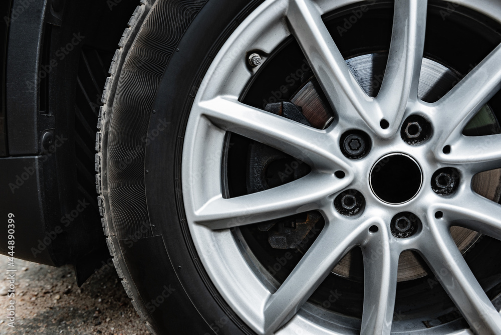 Close up of alloy car wheel.