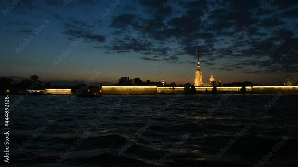 At night on a tourist ship an excursion along the Neva River in the city of St. Petersburg. View Sailing near the Peter and Paul Fortress. At night on a tourist ship an excursion along the Neva River in the city of St. Petersburg. View Sailing near the Peter and Paul Fortress.