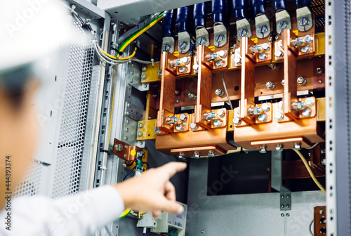 wire cable assemble or connect with copper busbar in electrical power cabinet for supply electric high power to production line or machine in manufacturing process industrial