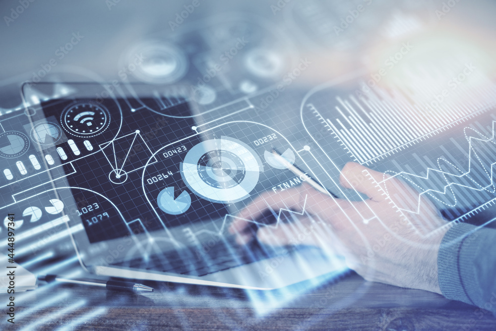 Double exposure of man's hands holding and using a digital device and tech theme hologram drawing. Technology concept. Double exposure of man's hands holding and using a digital device and tech theme hologram drawing. Technology concept.