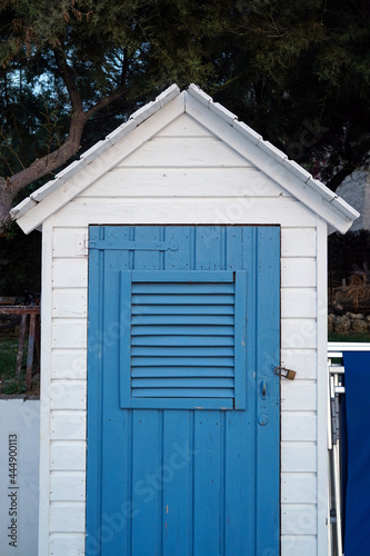 Fototapeta Naklejka Na Ścianę i Meble -  wooden cabin for changing and storing equipment on the beach