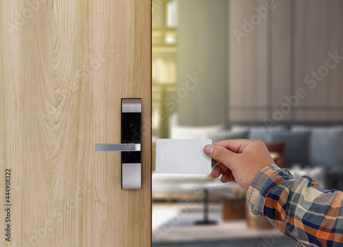 Using keycard to open the door or scan keycard open door.