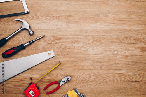Working tools on wooden background. top view