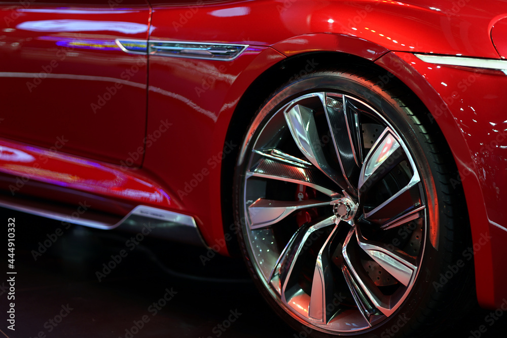 Modern style wheels in a red sports car. Modern style wheels in a red sports car.