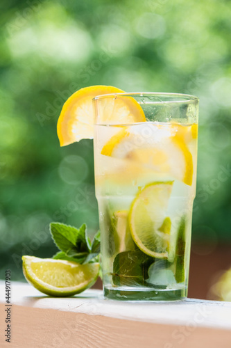 Lemonade with lemon, mint, lime, ice. Close-up. 