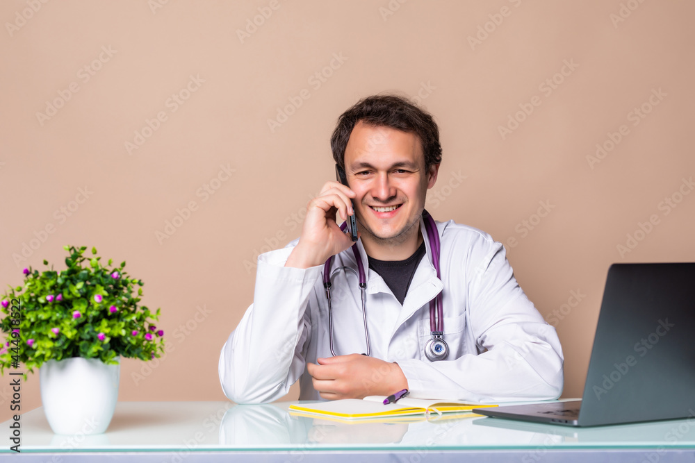 Smart and busy medic or doctor multitasking with phone isolated on white background Smart and busy medic or doctor multitasking with phone isolated on white background