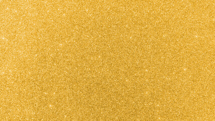 Gold glitter texture background sparkling shiny wrapping paper for Christmas holiday seasonal wallpaper  decoration, greeting and wedding invitation card design element